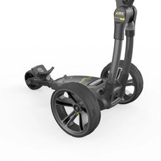 Moderner elektrischer Golf Trolley in Anthrazit mit großen Rädern auf weißem Hintergrund