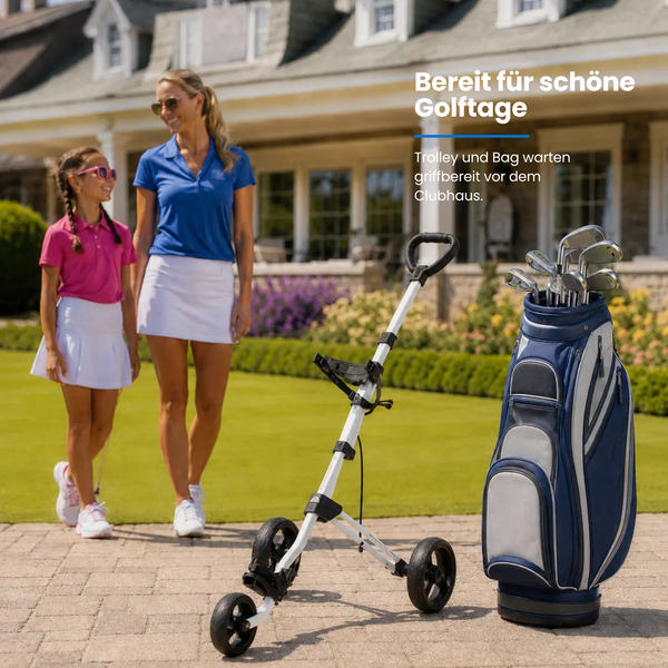 Big Max Junior Max 3W Push Trolley mit Golftasche vor einem Klubhaus.