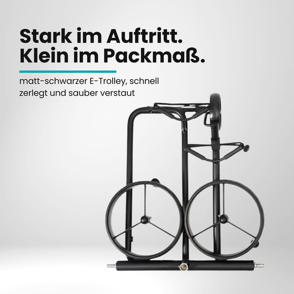 Schwarzer, zusammengeklappter Golftrolley mit großen Rädern auf weißem Hintergrund