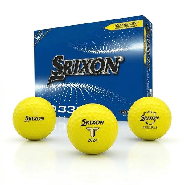 Drei gelbe Srixon AD333 Golfbälle mit Logo vor blauer Verpackung, Nahaufnahme.