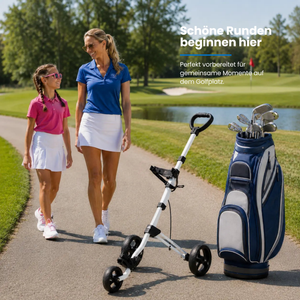 Big Max Junior Max 3W Push Trolley mit Golftaschen und -schlägern auf einem Golfplatz.