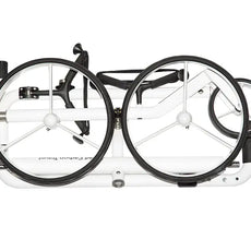 Zusammengeklappter weißer Golf Trolley aus Carbon von oben, leichte Transportlösung